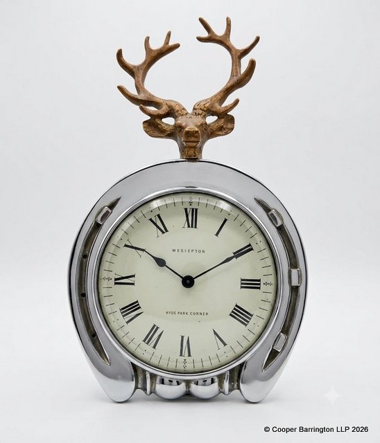 Vintage Wesiepton Hyde Park Corner London Horseshoe and Cast Metal Stag Desk Clock in Silver-Tone Case. Mid 20th Century. The white enamel dial with Roman numerals behind a bevelled glass running on a platform movement. Working order with key. Vintage Wesiepton Hyde Park Corner London Horseshoe and Cast Metal Stag Desk Clock in Silver-Tone Case. Mid 20th Century. The white enamel dial with Roman numerals behind a bevelled glass running on a platform movement. Working order with key.