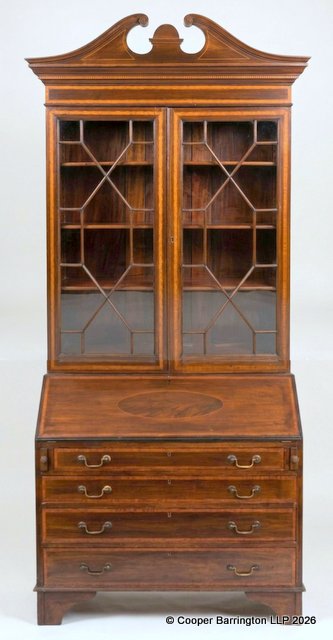 An Edwardian Sheraton Style Inlaid mahogany Bureau Bookcase, Early 1900. An Edwardian Sheraton Style Inlaid mahogany Bureau Bookcase, Early 1900.