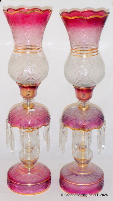 A Pair of Vintage Cranberry Glass Table Mantel Lusters,Shades and Crystal Drops Electric Lamps. Height 66 cm. These lamps with require rewiring by a qualified electrician. (2 items) A Pair of Vintage Cranberry Glass Table Mantel Lusters,Shades and Crystal Drops Electric Lamps. Height 66 cm. These lamps with require rewiring by a qualified electrician. (2 items)
